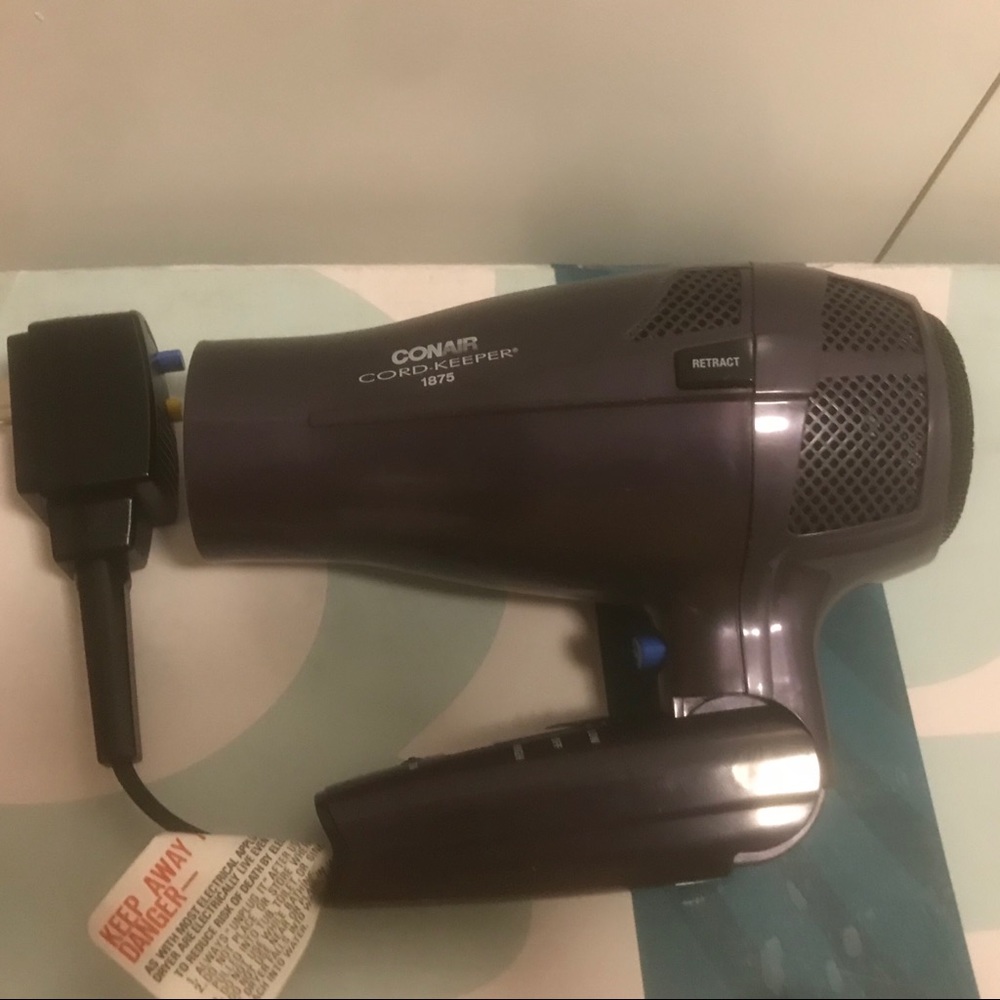 Purple Conair Retractable hair dryer